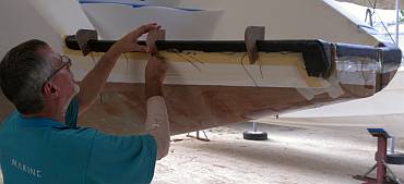 Mike checking wood stiffeners on the swim-platform carbon