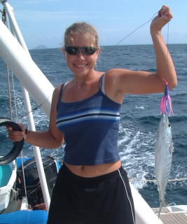 Amanda hauls in a nice Pacific tuna