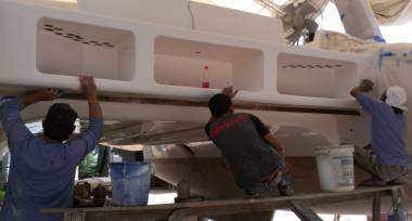 Pla, Baw, & Lek starting the long gelcoat polishing procedure