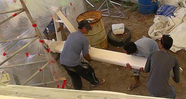 Removing the painted forebeam from the paint tent