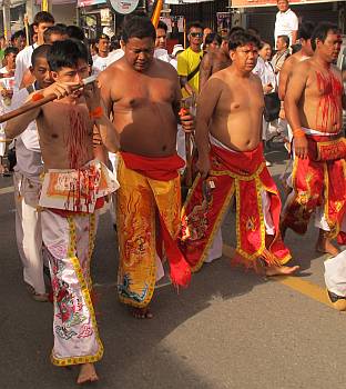 Tongue-cutters walking in the procession