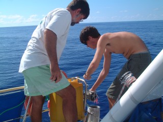 Jon & Chris refueling from our deck-jugs