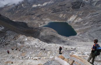 Descending the stairs on the back of Renjo La