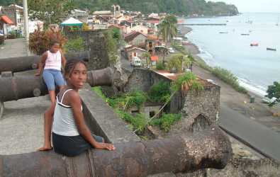 Martinique girls on the cannons above St. Pierre