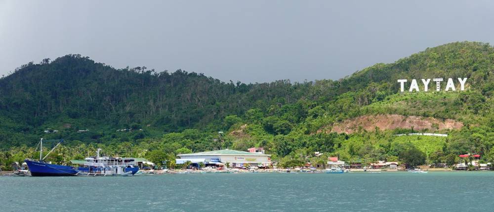 Taytay town from the anchorage - floating dock is behind blue freighter