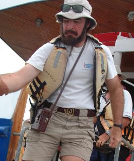 Tony disembarks Lobo into the panga for a shore tour.