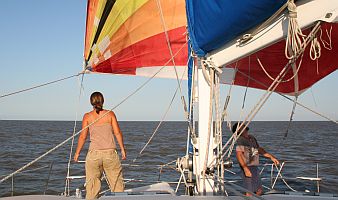 Jon and Amanda set the spinnaker