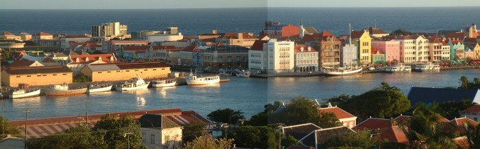 Willemstad's colorful floating market and downtown area, by evening light