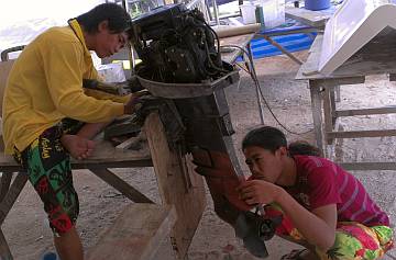 Yando and Chambron got the outboard completely sanded