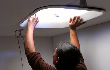 Houa fitting the new trim for the large Lewmar hatch